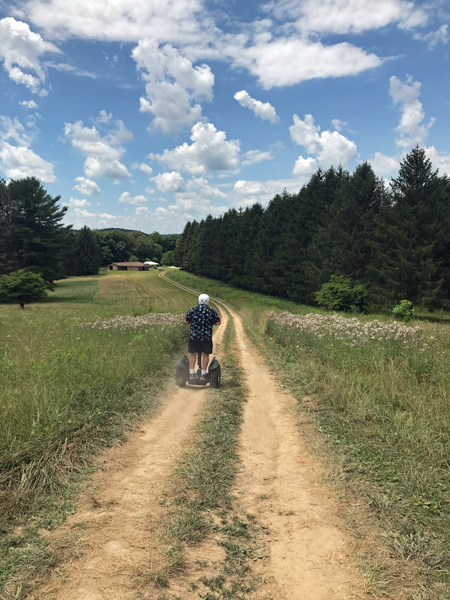 Lee Duquette going down the hig hill on Segway